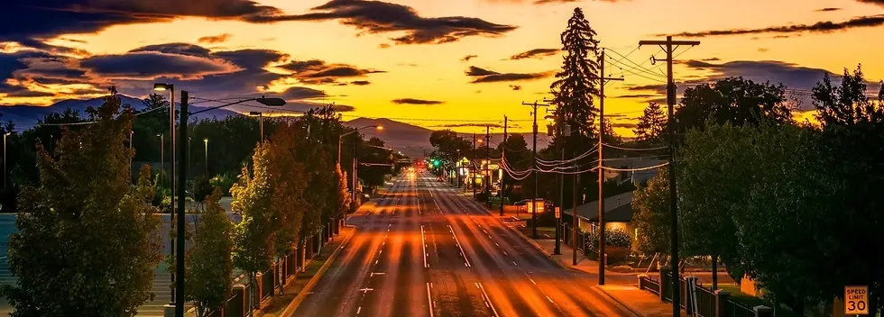 Washington landscape and roadway at sunset