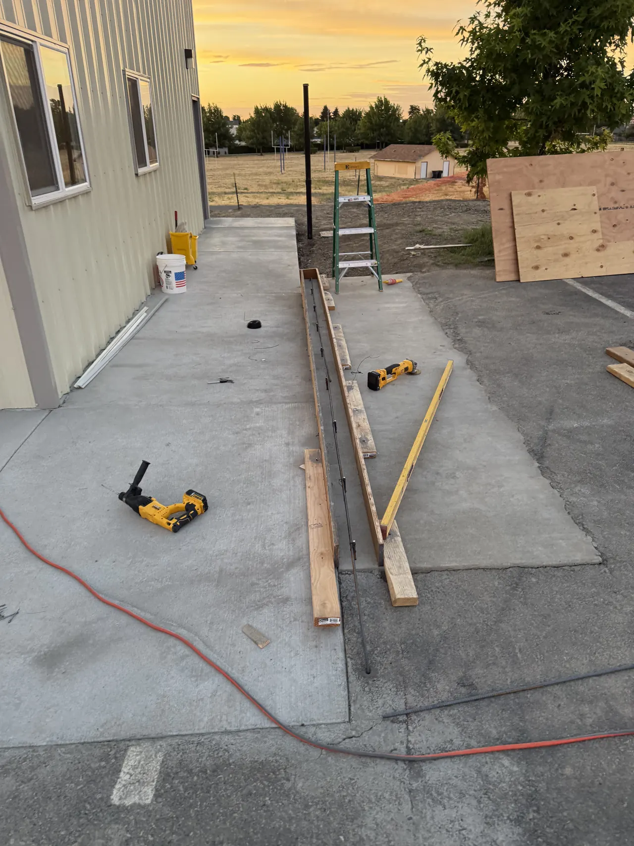 Concrete walkway work beside the building at Walla Walla Veterans Home